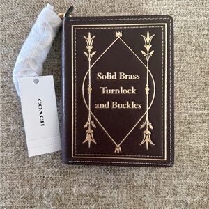 Coach notebook charm in maple